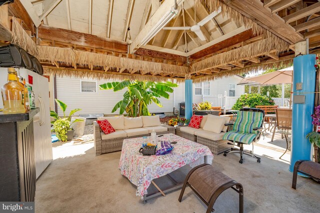 view of patio / terrace featuring an outdoor hangout area and a gazebo