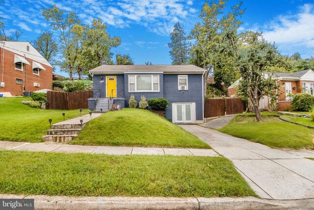 view of front of property with a front lawn