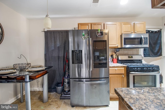 kitchen with tasteful backsplash, hanging light fixtures, light brown cabinets, and appliances with stainless steel finishes