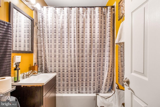 bathroom featuring shower / bath combination with curtain and vanity