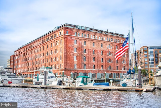 view of building exterior featuring a water view