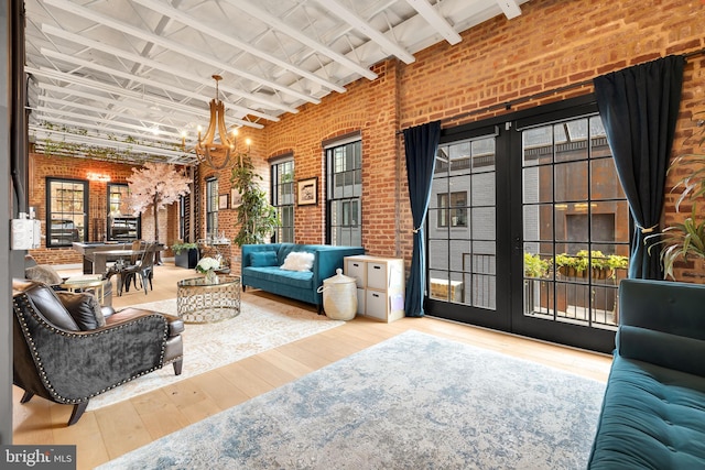 interior space featuring french doors and outdoor lounge area