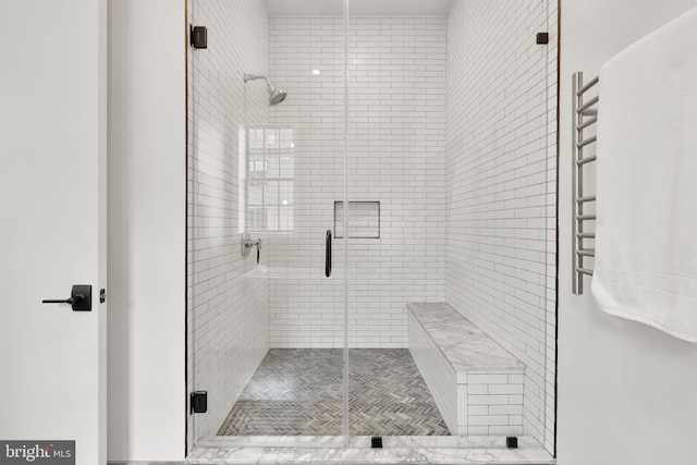 full bathroom featuring a shower stall