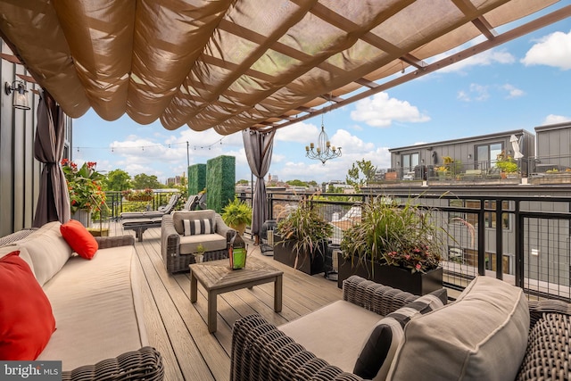 balcony featuring a view of city and outdoor lounge area