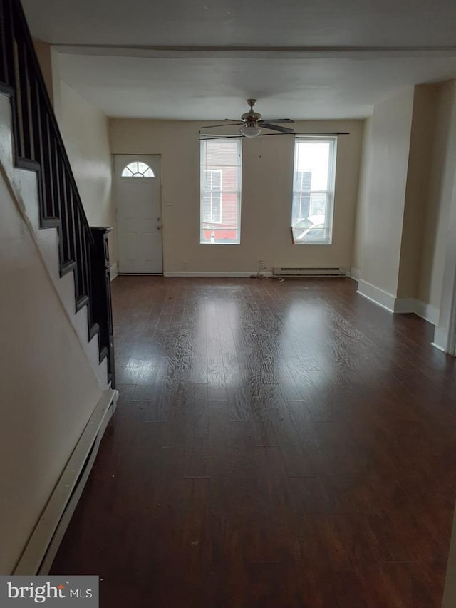 foyer entrance featuring ceiling fan, hardwood / wood-style floors, and a baseboard radiator