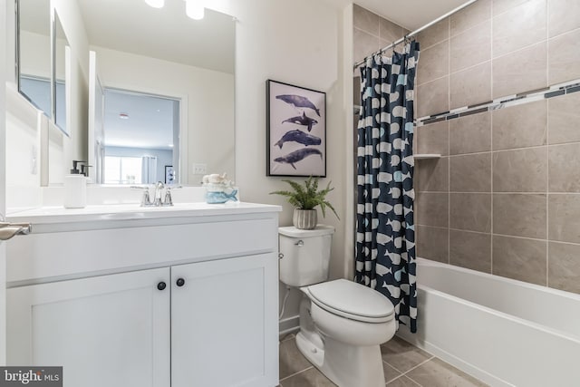 bathroom featuring tile patterned floors, shower / tub combo, toilet, and vanity