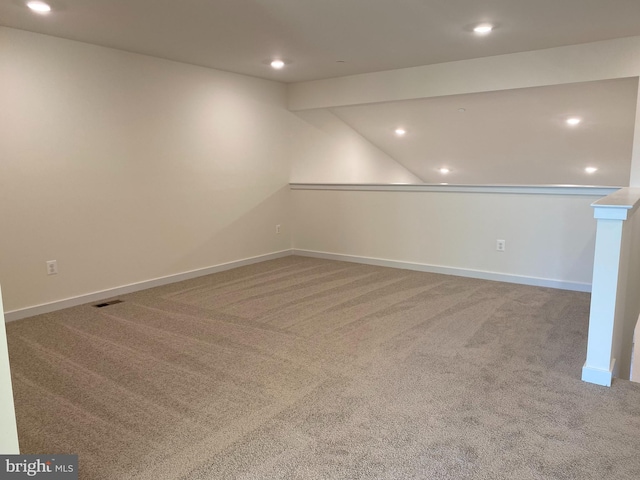 carpeted spare room with visible vents, recessed lighting, and baseboards