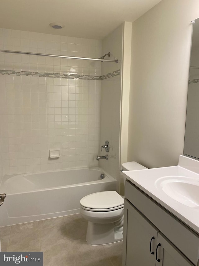 full bathroom featuring tile patterned floors, vanity, toilet, and bathing tub / shower combination