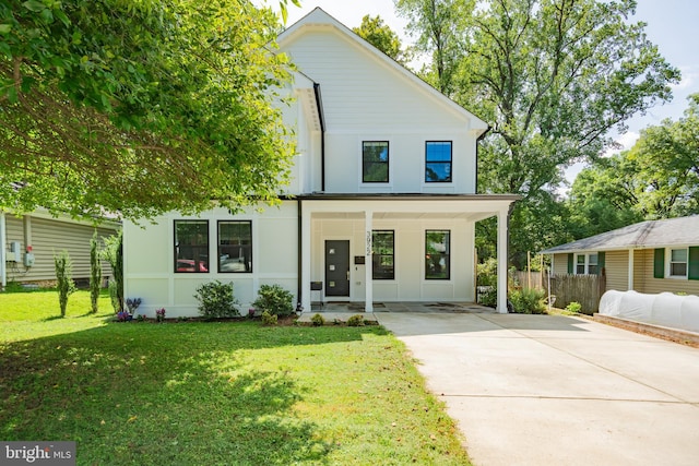 modern inspired farmhouse with a front yard