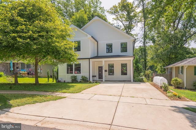 view of front of property with a front lawn