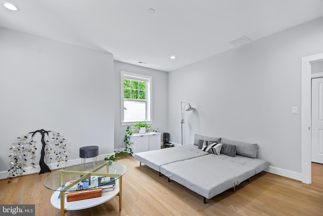 bedroom with recessed lighting, visible vents, light wood-style flooring, and baseboards