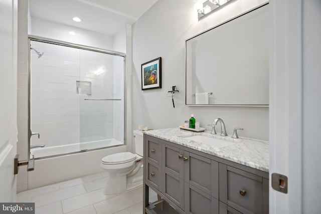 full bath with toilet, tile patterned floors, combined bath / shower with glass door, vanity, and recessed lighting