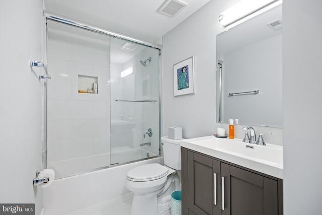 full bathroom featuring visible vents, vanity, toilet, and bath / shower combo with glass door