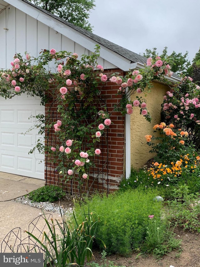 view of property exterior with a garage