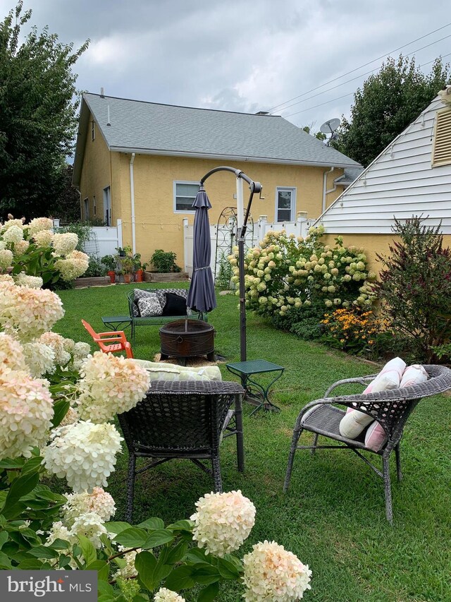 view of yard at twilight