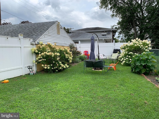 view of yard with fence