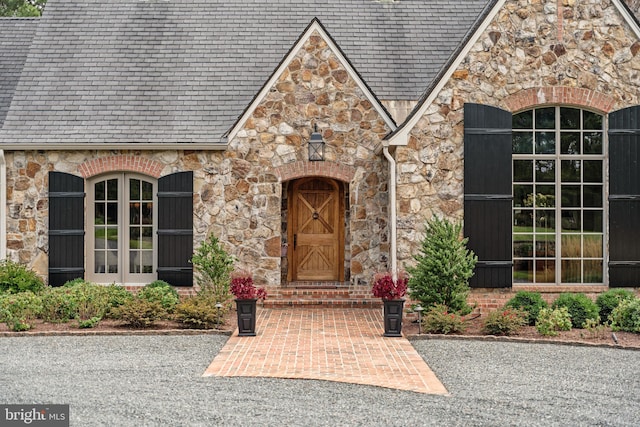 doorway to property featuring french doors