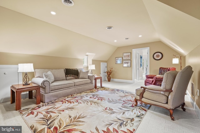 living room with lofted ceiling and light colored carpet