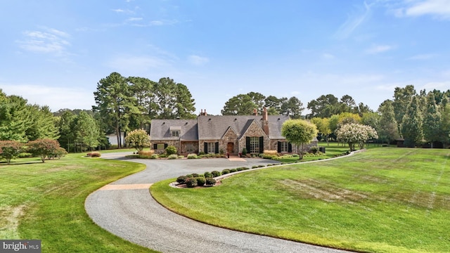 view of front of home with a front yard