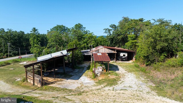 exterior space featuring an outbuilding