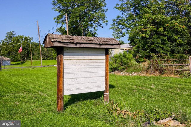 view of outdoor structure with a yard