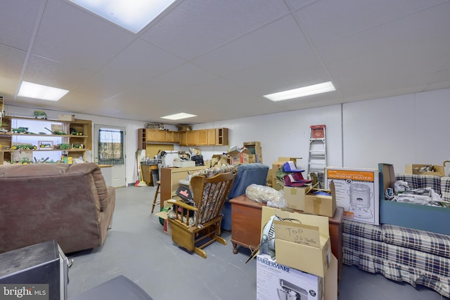 interior space featuring a drop ceiling