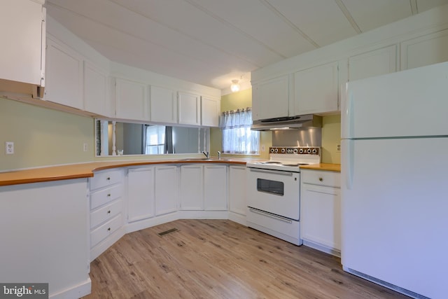 kitchen featuring sink, light hardwood / wood-style flooring, white cabinetry, and white appliances