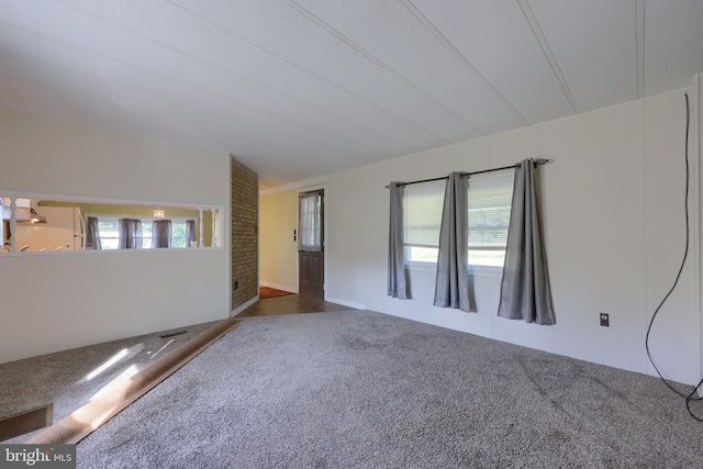 unfurnished room with carpet floors