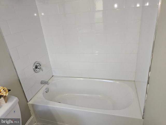 full bathroom with shower / bathtub combination and toilet