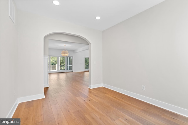 empty room with wood-type flooring