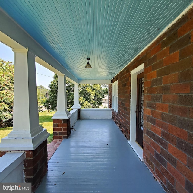 view of patio featuring a porch