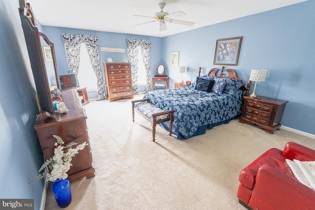 bedroom featuring ceiling fan and carpet floors