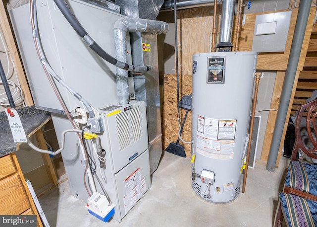 utility room with water heater and heating unit