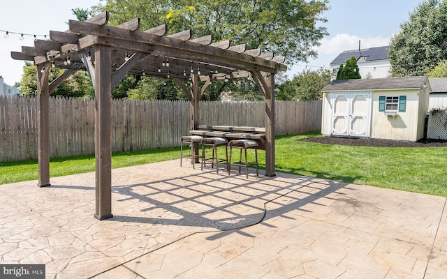 view of patio / terrace featuring a pergola and a shed