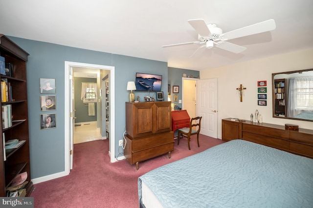 bedroom with dark colored carpet and ceiling fan