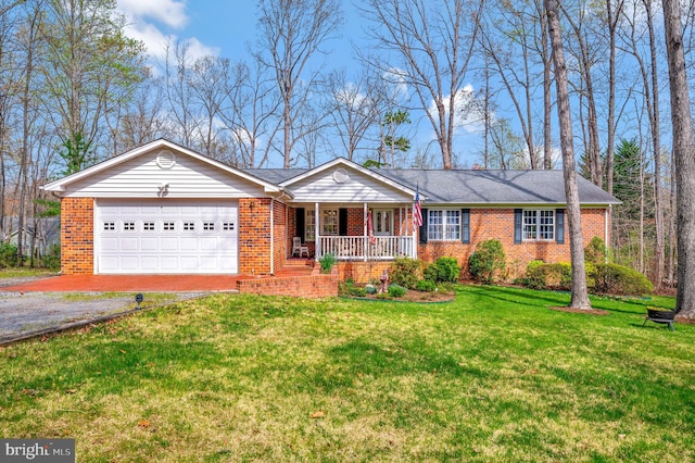 ranch-style home with a garage, a porch, and a front yard