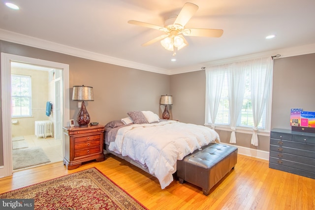 bedroom featuring radiator, light wood finished floors, ornamental molding, and recessed lighting