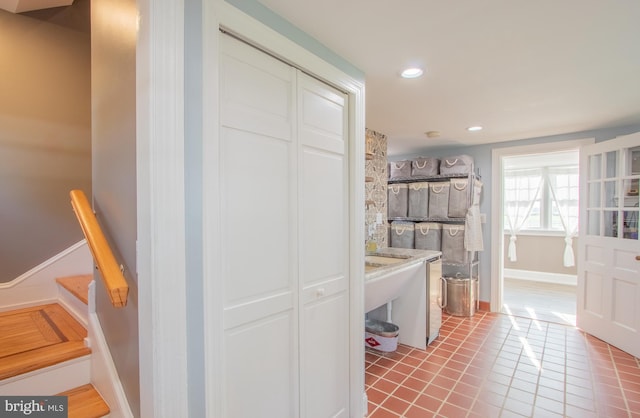 interior space featuring recessed lighting and light tile patterned floors