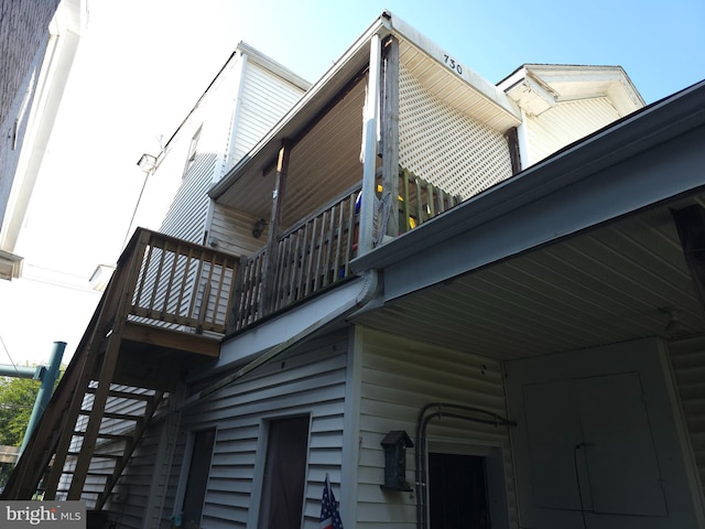 view of home's exterior with a balcony