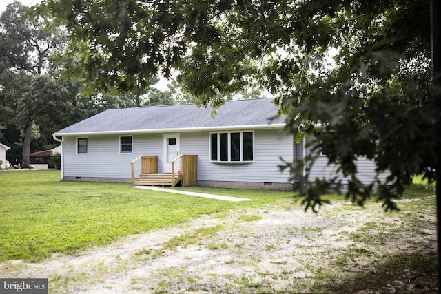 view of front of house with a front lawn