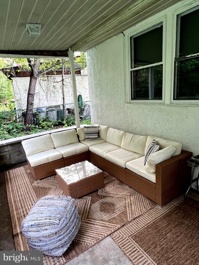 exterior space with an outdoor living space