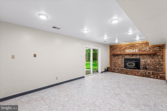 unfurnished living room with baseboards and visible vents