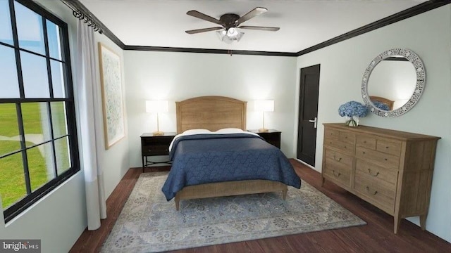 bedroom featuring ornamental molding, dark wood finished floors, and a ceiling fan