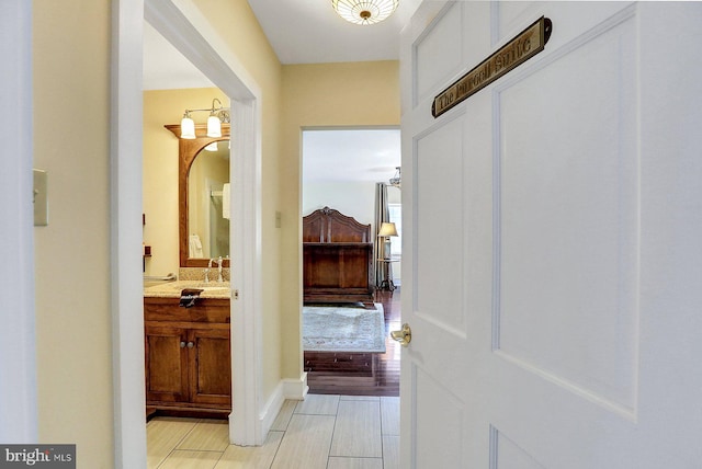 hall with light wood-type flooring