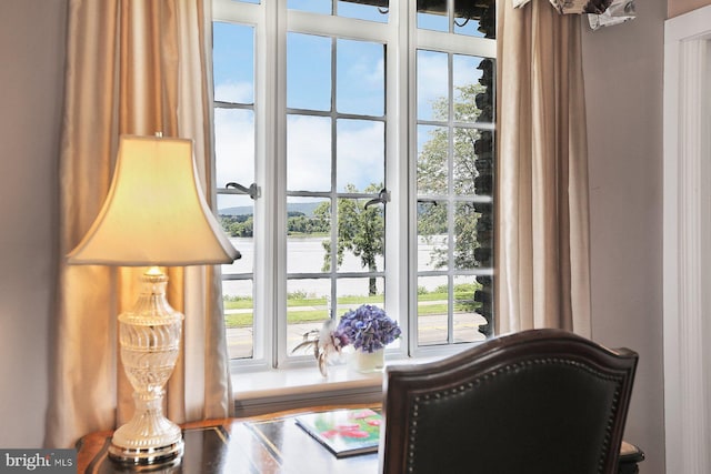 entryway featuring a water view