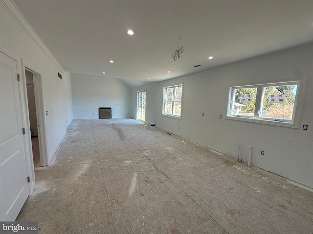 unfurnished living room with recessed lighting