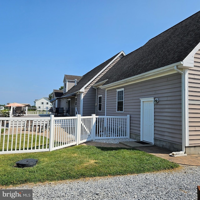 exterior space with a yard