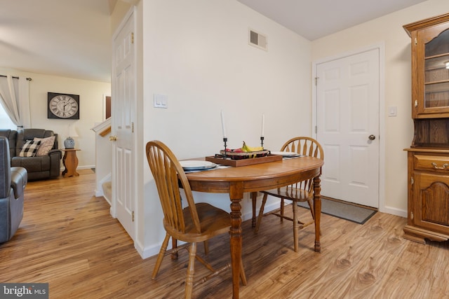 dining room featuring light wood-type flooring