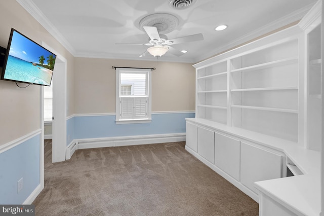 empty room featuring visible vents, ornamental molding, a ceiling fan, light carpet, and baseboards