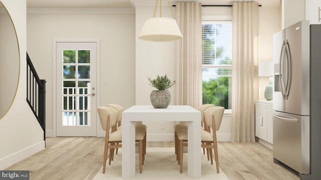 dining room with light hardwood / wood-style flooring